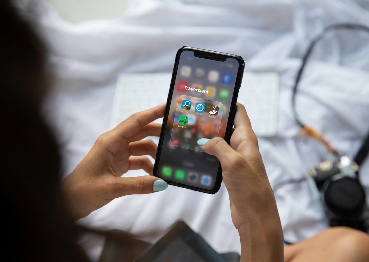 Person using Traversient apps on a mobile device
